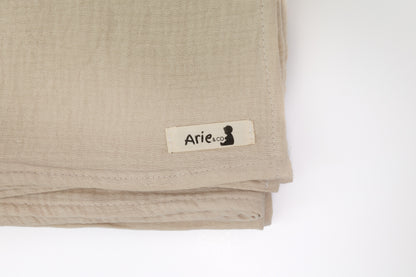 LIGHT TAN MUSLIN SWADDLE