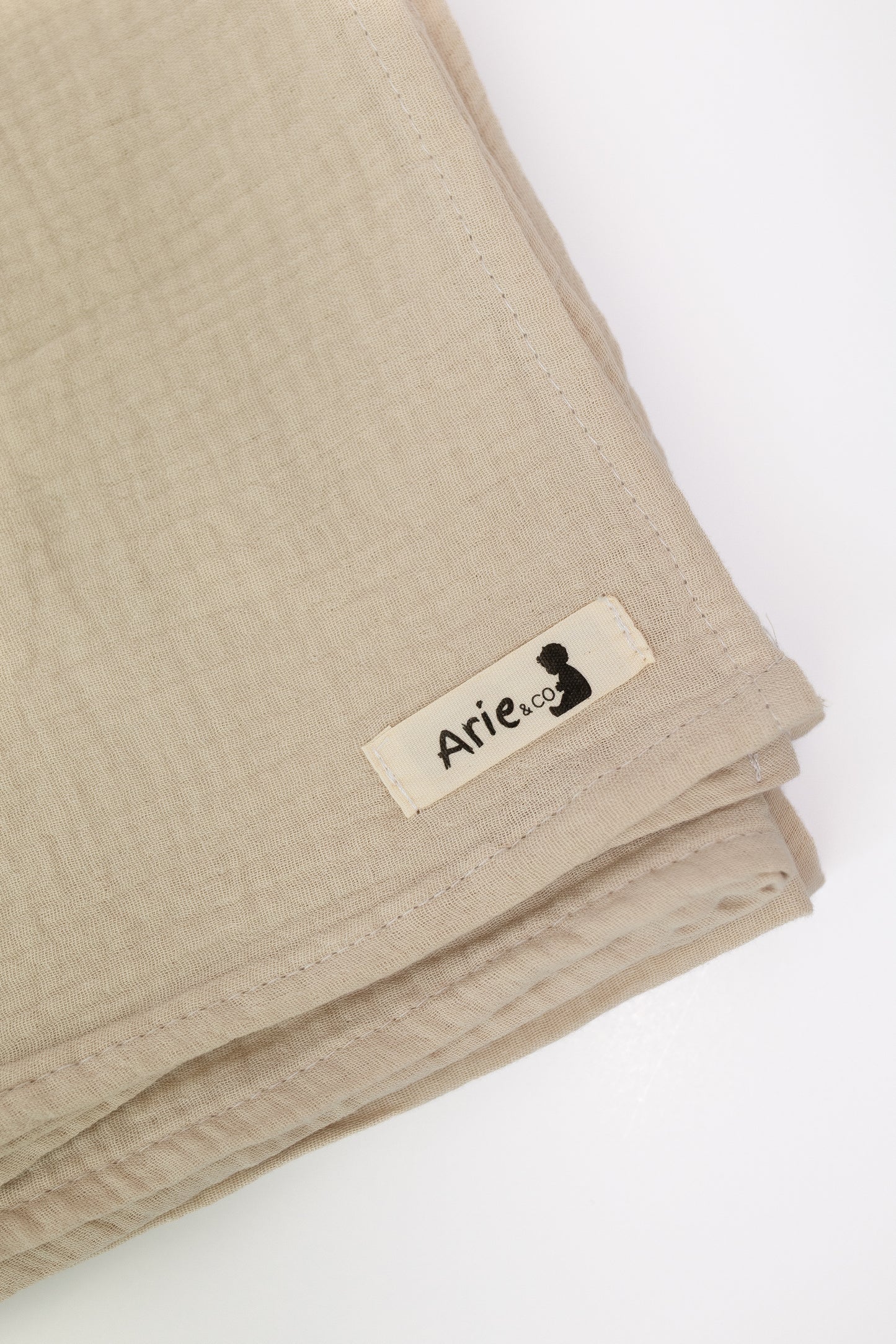 LIGHT TAN MUSLIN SWADDLE