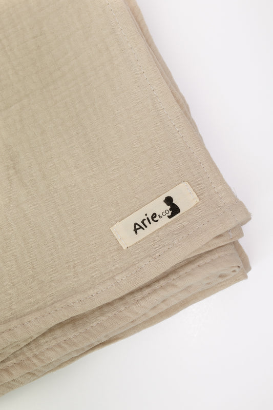 LIGHT TAN MUSLIN SWADDLE