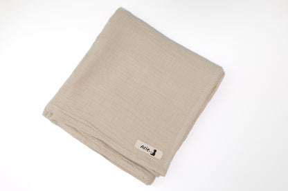 LIGHT TAN MUSLIN SWADDLE